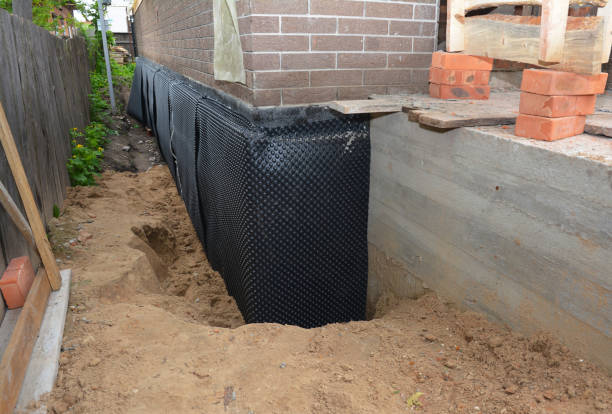 Happy homeowners after waterproofing job in Morley
